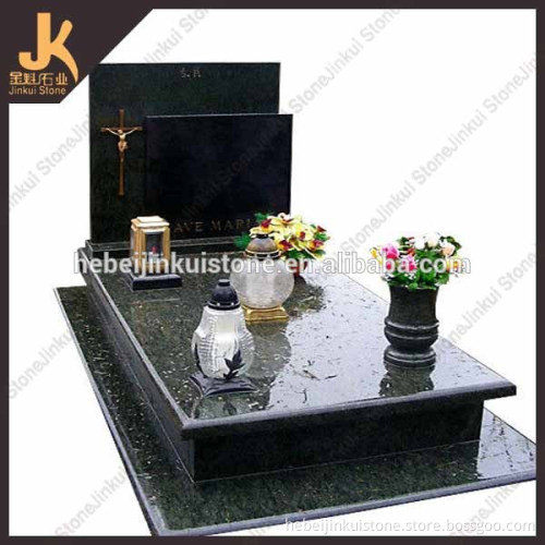 black gravestone with vase